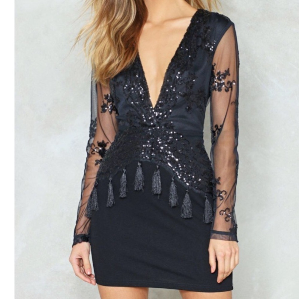 Bodycon dresss with plunging neckline and sequins *a few tassels missing